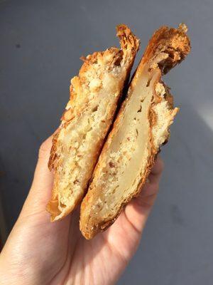 Inside of almond croissant (left half has been bitten)