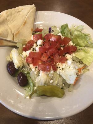 Bland Greek salad with no onion.