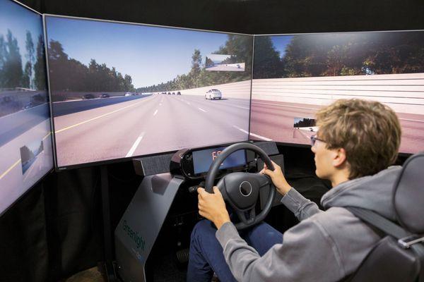 Teen driver on the freeway in the Greenlight driving simulator.