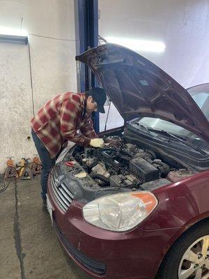 Luisangel is replacing a valve cover gasket on a Hyundai