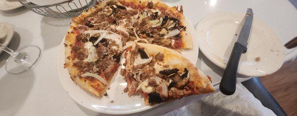 Pizza with mushrooms, onions, and olives. Holly was our server, she is awesome! Very authentic food.