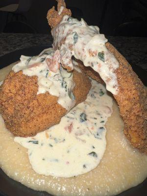 Fried catfish and grits with creamy sauce