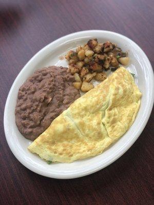 Spinach Omelette 

Served with refried beans & Mexican potatoes