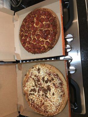 Left: sausage not even almost distributed evenly. Right: chose to not cut the pizza. Employees don't care.