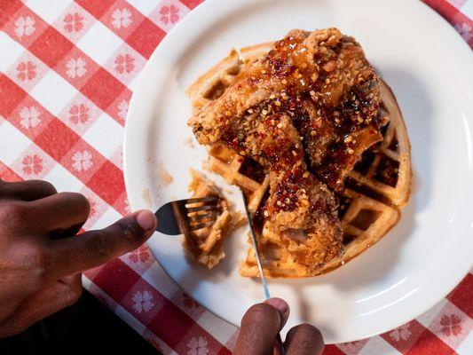 Chicken and Waffles: This soulful masterpiece combines crispy, succulent fried chicken with fluffy, golden-brown waffles.