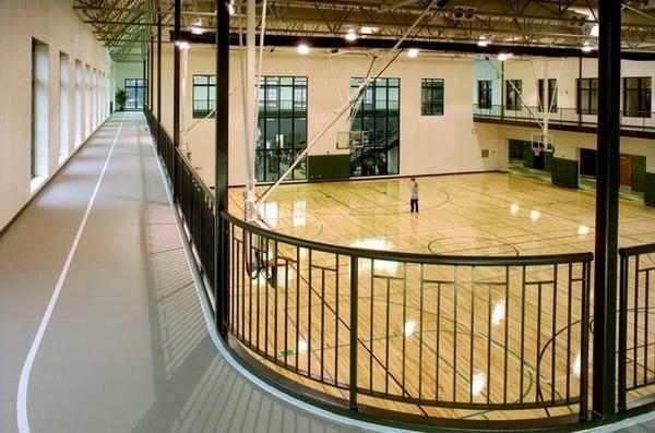 The Lodge has a full gymnasium for basketball and volleyball.  The 1/10 a mile indoor track circles around the top.