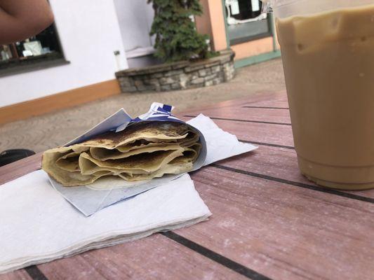 Coffee with a stuffed French toast crepe