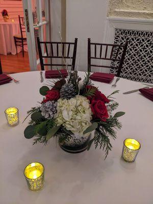 Boxwood and centerpiece arrangements for company holiday party