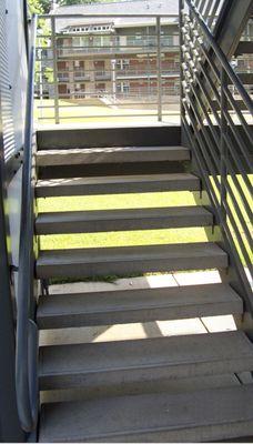 Replace broken concrete steps for condo and apartment.