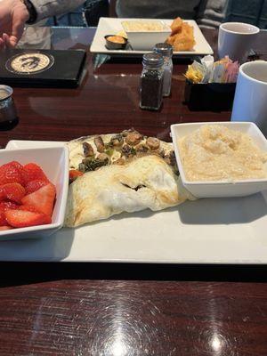 Egg white omelet, grits, strawberries