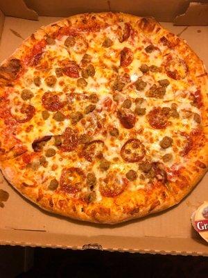 Large pepperoni and sausage pizza.