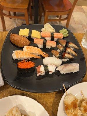 Our array of sushi (tamago, fried tofu skin, crab meat, shrimp, eel, squid, roe, squid, octopus, and mackeral)