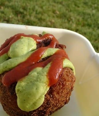 Deep fried cheese grits with nomad sauce and sriracha