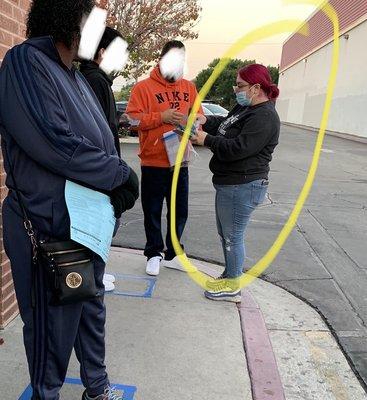 DMV employee with mask on incorrectly.