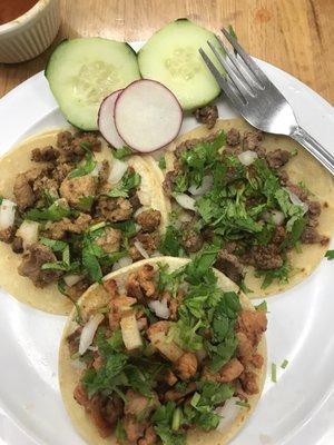 Pastor, chicken, and Carne asada tacos