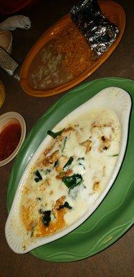 Chciken, spinach & mushrooms in a sour cream sauce. Served with great flour tortillas! Messy, but YUM!