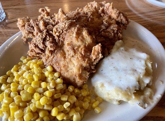 Sunday Fried Chicken Breast with two sides: mashed potatoes with white gravy and corn. Delicious! Easily enough for two.