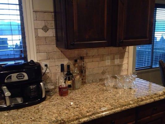 Venitian Gold 2CM Double Ogee Edge with Travertine Backsplash