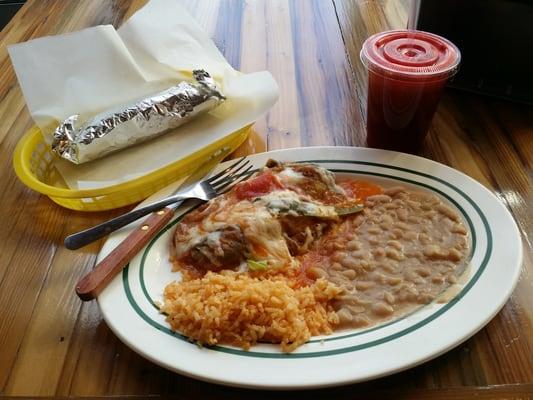 Chile Relleno plate, beans, rice, tortillas, and beats, carrots,  and orange juice.