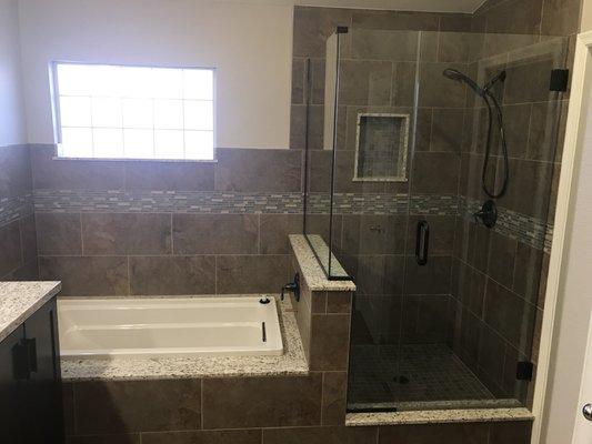 Wide shot of the bathtub and shower after remodel.  Just amazing work and attention to detail!