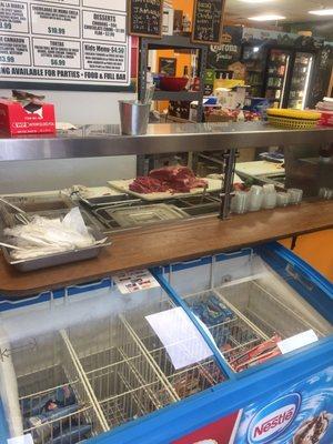 Not so sure the fresh food prep area is the appropriate place to cut meat. Blood dripping onto the cut vegetables is no bueno.