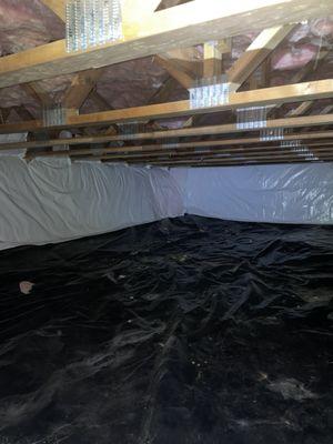 Super clean crawlspace project, vapor barrier on the floor, vinyl faced fiberglass on the walls and batt in the ceiling.  Cozy!