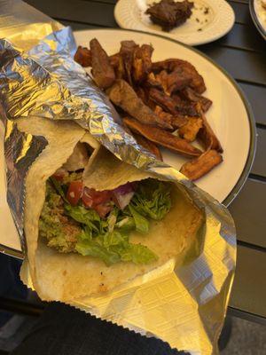 Falafel  on gluten free wrap with a side of sweet potato fries