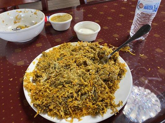 This was the overflowing plate of veggie biryani, with the giant potato pieces hidden, made a big mess