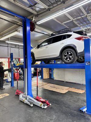 Wahid and crew member. Doing an oil change for 2020 Crosstrek.