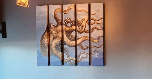 Wall hanging featuring a giant octopus