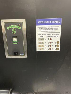 Change machine dispenses $1 and 25 cent token. Washers and Dryers accept $1 tokens, 25 cent tokens, $1 Susan B Anthony coins and quarters