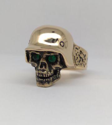 Custom Made 18k 1oz. Skull Ring featuring Green Emerald eyes.