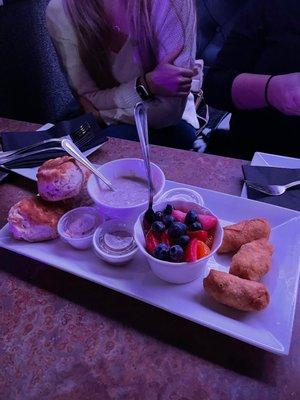 House appetizers-Biscuits and gravy, fruit and egg-egg rolls.