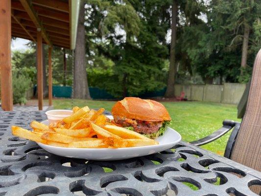 Texas Heat burger with an impossible patty, fries and bob sauce on the side.