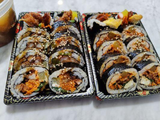 Pork cutlet Kimbap (left) and spicy squid Kimbap (right)