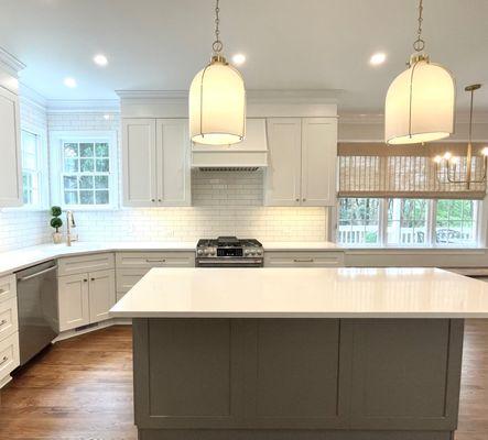 New Layout. New Cabinets. Quartz counters. New appliances and lighting. New floors and tile backsplash. Cary, NC