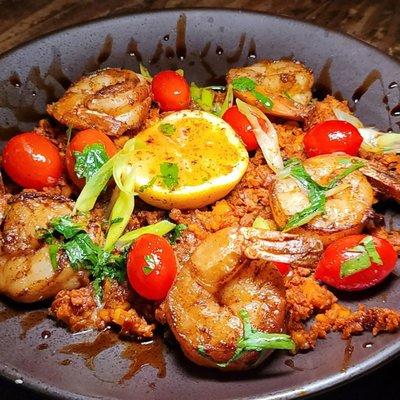 Prawns on muhammara spread