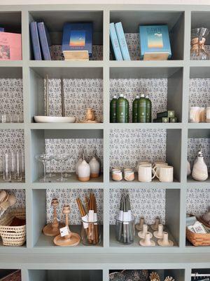 Our shelves are stocked for the season with handmade pottery, tablewares, puzzes, candles, and so much more.