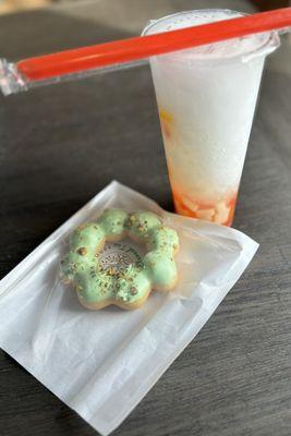 Lychee slush with rainbow jelly and a pistachio mochi donut.