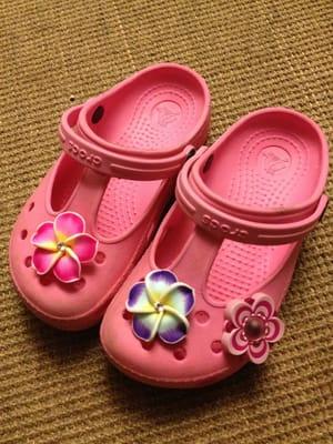 Cute souvenirs of our trip to Hawaii for her old crocs $9 for 3