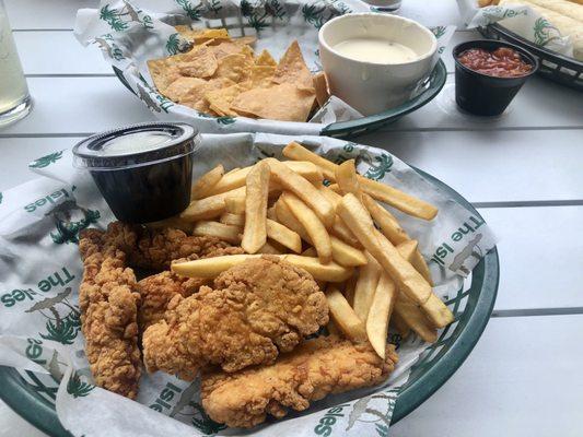 Chicken tenders and fries (top of photo, what's left of chips & dip).