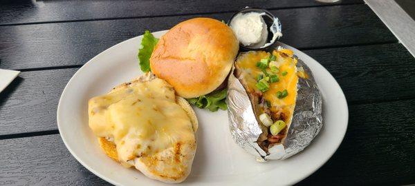 SUPER tender smothered chicken sandwich and loaded baked potato