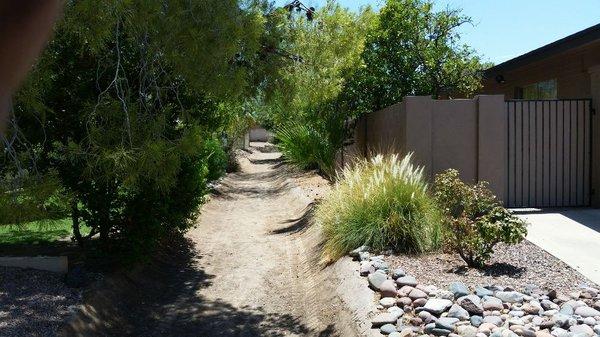 We cleaned out this flood irrigation canal it was full of rocks and sand