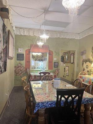 One of the several dining areas very cute Decour . Country chic atmosphere.