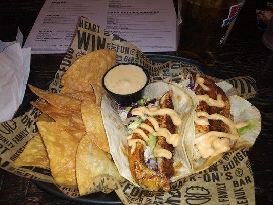 Red fish tacos with chips and queso. Excellent. About $12.