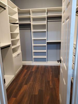 New ceramic tile flooring in a master walk in closet.