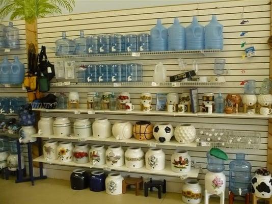 We have a great selection of bottles, crocks & Stands