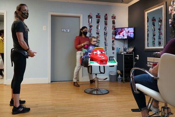 Our son receiving his first haircut. Such a great experience.