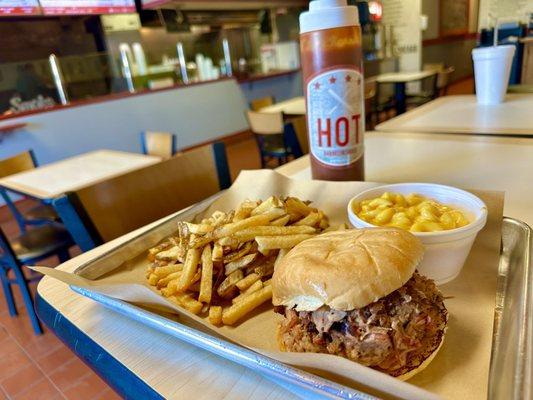 Pulled pork sandwich, Mac n cheese and fresh cut fries.  The food was pretty good, the BBQ sauce made the sandwich better.