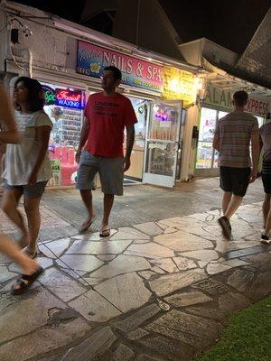 Sidewalk on Kuhio Ave, next to McDonald's!